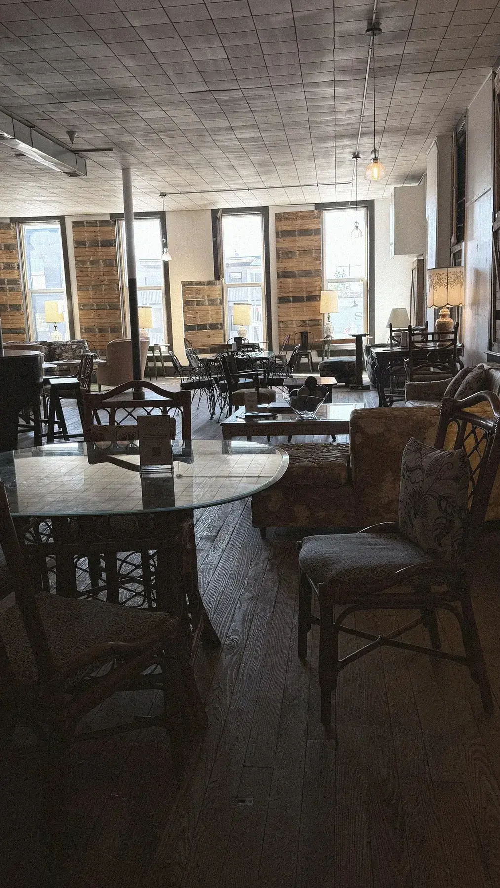 A Whole World of Good — 10,000 sq. ft. downtown executive lounge with tin ceilings, reclaimed wood, and vintage furniture